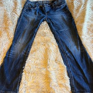 Express boot it jeans with extra detail on sides and back pockets 12 r